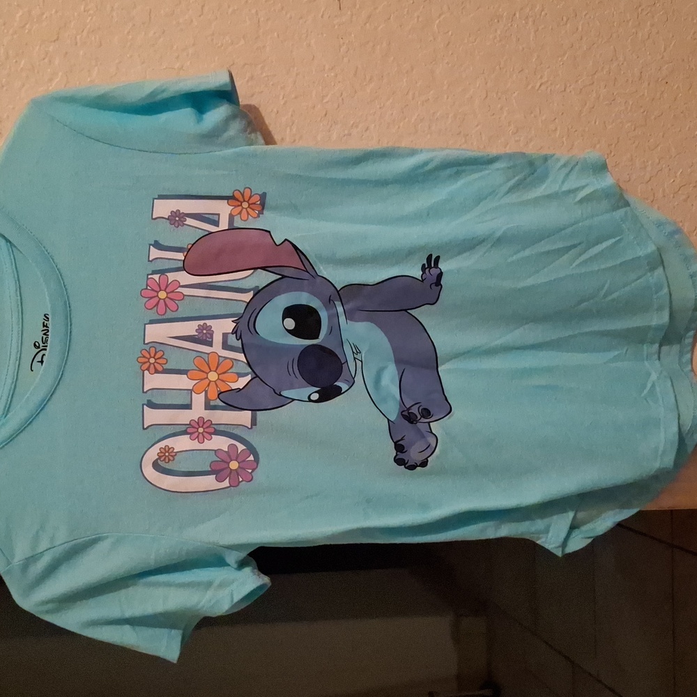A light blue stitch tee shirt